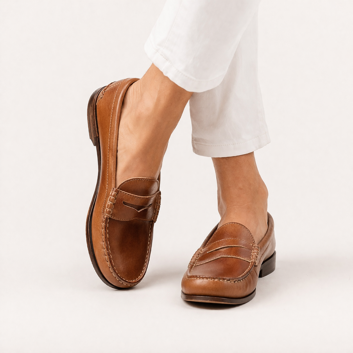 Women's loafers round toe penny strap visible stitching