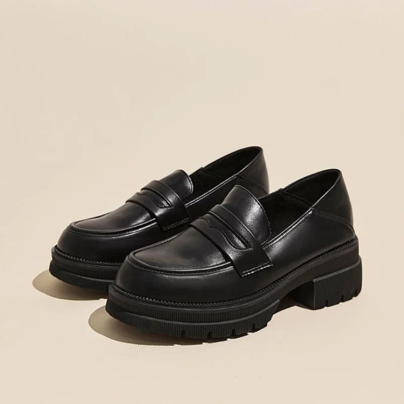 Mocassins femme à plateforme crantée et bride