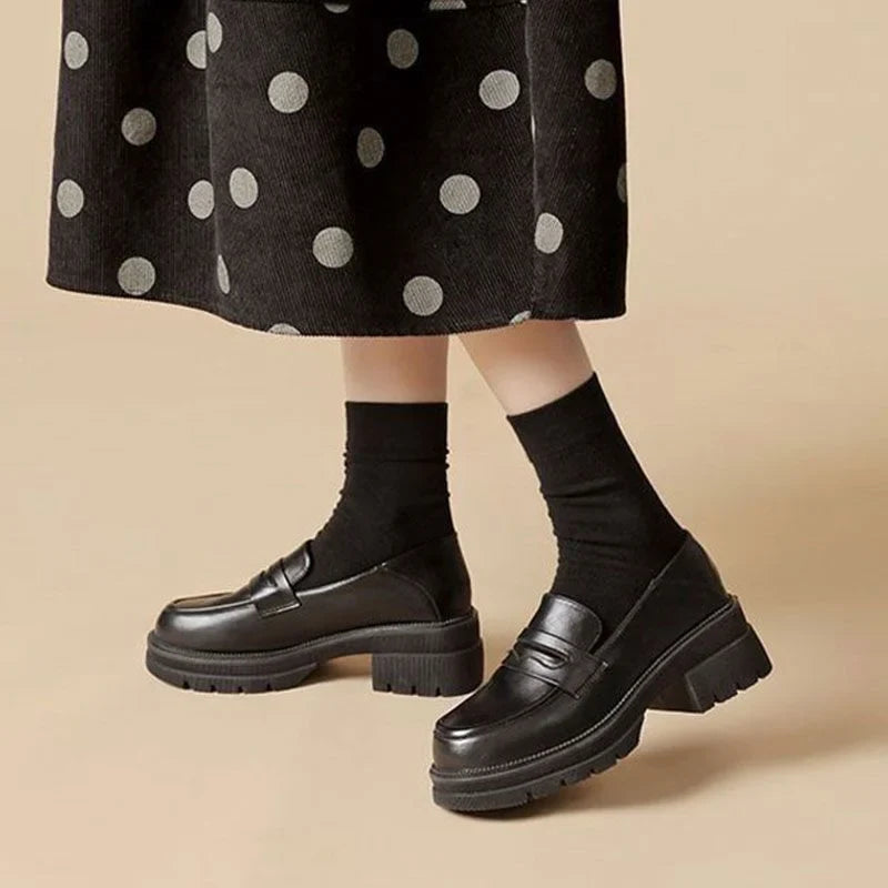 Mocassins femme à plateforme crantée et bride